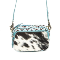 LIlly leren turquoise schoudertas met vacht