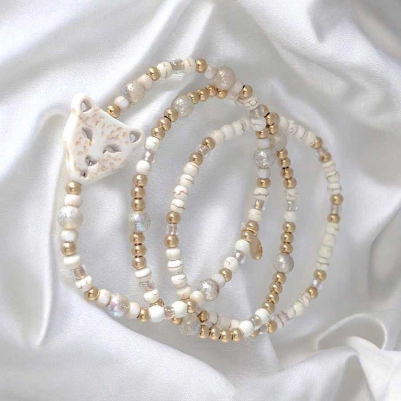 LUIPAARD set 3  kralen armbanden off white met goud rvs