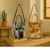 MAVERICK schoudertas canvas met koeienhuid zwart